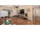 Spacious living room featuring wood floors, lots of sunlight, and neutral paint color at 4915 W Libby St, Glendale, AZ 85308
