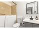 Clean bathroom features a vanity, mirror, and walk-in shower at 5322 N Oro Vista Ct, Litchfield Park, AZ 85340