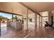 Covered patio view, showcasing the outdoor kitchen, with ample space for seating and entertaining at 5322 N Oro Vista Ct, Litchfield Park, AZ 85340
