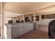 Under-cover patio area with an outdoor kitchen and plenty of space for entertaining at 5322 N Oro Vista Ct, Litchfield Park, AZ 85340
