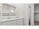 Well-lit bathroom features double sinks, quartz counters, and a large mirror at 5704 E Smeaton Pl, San Tan Valley, AZ 85140