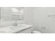 Bright bathroom features a single sink with a white marble countertop, and a large mirror above it at 5704 E Smeaton Pl, San Tan Valley, AZ 85140