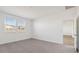 Bedroom featuring neutral carpeting, a double window, and ample natural light at 5704 E Smeaton Pl, San Tan Valley, AZ 85140