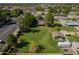 Spacious lot with mature trees, a detached structure, and room for outdoor activities at 6637 W Pershing Ave, Glendale, AZ 85304