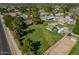 Expansive lot features mature trees, a detached structure, and ample space for various activities at 6637 W Pershing Ave, Glendale, AZ 85304
