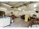 Messy garage interior with an assortment of tools, equipment, and supplies at 6637 W Pershing Ave, Glendale, AZ 85304