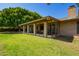 Enclosed patio area featuring brick pillars and screens with outdoor dining set at 6637 W Pershing Ave, Glendale, AZ 85304