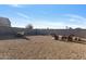Spacious backyard features gravel, block wall, and patio furniture at 7812 W Payson Rd, Phoenix, AZ 85043