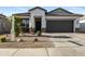 Charming single-story home featuring a low-maintenance yard and a two-car garage at 7812 W Payson Rd, Phoenix, AZ 85043