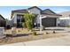 Attractive front yard with desert landscaping, complemented by a well-maintained home exterior at 7812 W Payson Rd, Phoenix, AZ 85043