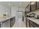 Well-equipped kitchen with stainless steel appliances and plenty of counter space at 7812 W Payson Rd, Phoenix, AZ 85043