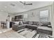 This open floor plan showcases the living room and kitchen, creating a cozy atmosphere at 7812 W Payson Rd, Phoenix, AZ 85043