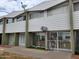 Townhouse exterior featuring tidy landscaping and neutral siding at 815 N Hayden Rd # B4, Scottsdale, AZ 85257