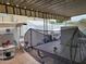 Covered outdoor patio with ping pong table and a cozy seating area at 815 N Hayden Rd # B4, Scottsdale, AZ 85257