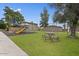 Playground and picnic area in a community park setting at 815 N Hayden Rd # B4, Scottsdale, AZ 85257