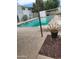 Community pool with lounge chair and desert landscape accents at 815 N Hayden Rd # B4, Scottsdale, AZ 85257