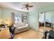 Well-lit bedroom with hardwood floors, light walls, and a closet with mirrored doors at 8241 N Central Ave # 2, Phoenix, AZ 85020