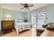 Comfortable bedroom with hardwood floors and access to an outdoor patio at 8241 N Central Ave # 2, Phoenix, AZ 85020