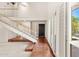 Bright foyer with stairs, tile floors, and natural light at 8637 E Via De La Escuela --, Scottsdale, AZ 85258