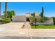 A well-maintained home featuring modern design, desert landscaping, and an attached two-car garage at 8637 E Via De La Escuela --, Scottsdale, AZ 85258