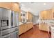 Modern kitchen with stainless steel appliances, light wood cabinets and granite countertops at 8637 E Via De La Escuela --, Scottsdale, AZ 85258