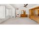 Spacious main bedroom with large windows, wood dresser, and a walk in closet with entry to the staircase at 8637 E Via De La Escuela --, Scottsdale, AZ 85258