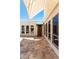 Spacious patio featuring stone tile flooring and a covered seating area for relaxing and entertaining at 8637 E Via De La Escuela --, Scottsdale, AZ 85258
