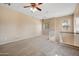 Spacious loft area with plush carpeting, and a ceiling fan at 9233 E Neville Ave # 1125, Mesa, AZ 85209