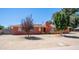 Charming single-story home with a stucco exterior, landscaping, and a welcoming front entrance at 1001 W Northern Ave, Phoenix, AZ 85021