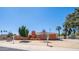 Cozy single-story home with a stucco exterior, front yard landscaping, and a charming residential street at 1001 W Northern Ave, Phoenix, AZ 85021