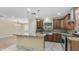 Gourmet kitchen with stainless steel appliances, custom cabinets, and granite countertops at 1001 W Northern Ave, Phoenix, AZ 85021