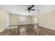 Bright living room with plantation shutters and wood-look floors throughout at 1001 W Northern Ave, Phoenix, AZ 85021