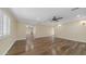 Spacious living room with hardwood floors, recessed lighting, and neutral paint at 1001 W Northern Ave, Phoenix, AZ 85021