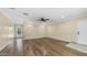 Open living area features wood-look floors and easy access to the backyard pool at 1001 W Northern Ave, Phoenix, AZ 85021
