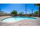 Inviting backyard pool with brick pavers, perfect for outdoor relaxation and summer enjoyment for all at 1001 W Northern Ave, Phoenix, AZ 85021