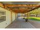 Expansive covered patio with backyard artificial turf at 1108 E Georgia Ave, Phoenix, AZ 85014