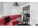 Bright dining area featuring a built-in booth and round table, with views of the kitchen at 1108 E Georgia Ave, Phoenix, AZ 85014