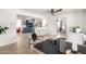 Bright living room with modern furnishings, polished concrete floors, and an open layout at 1108 E Georgia Ave, Phoenix, AZ 85014