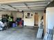 Spacious garage with organized storage and ample room for parking and projects at 11867 W Alvarado Rd, Avondale, AZ 85392