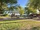 Outdoor playground and picnic area with shade for outdoor entertaining in the community at 11867 W Alvarado Rd, Avondale, AZ 85392