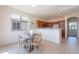 Eat in dining area featuring a round table, natural lighting, and seamless access to the kitchen at 1187 E Frances Ln, Gilbert, AZ 85295