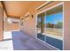 Covered patio with a tile floor and sliding glass door to the home at 1187 E Frances Ln, Gilbert, AZ 85295