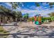 Community playground featuring vibrant play structures and shaded seating areas at 1187 E Frances Ln, Gilbert, AZ 85295
