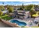 Stunning aerial view of a home showcasing a backyard pool, spacious yard, and inviting outdoor space at 13411 N 50Th St, Scottsdale, AZ 85254