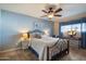 Serene bedroom featuring a comfortable bed and a desk, ideal for rest and work at 13411 N 50Th St, Scottsdale, AZ 85254