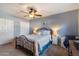 Inviting bedroom features a closet, cozy bed, and neutral decor, perfect for relaxation at 13411 N 50Th St, Scottsdale, AZ 85254
