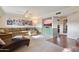 Comfortable living room with a TV and hardwood floors, ideal for relaxation at 13411 N 50Th St, Scottsdale, AZ 85254