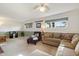 Cozy living room features neutral paint, large windows, and plush seating for a welcoming space at 13411 N 50Th St, Scottsdale, AZ 85254