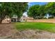 Spacious backyard with lush green grass, perfect for outdoor activities and entertaining at 1377 W Park Ave, Gilbert, AZ 85233