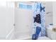 Bathroom tub with shower at 1377 W Park Ave, Gilbert, AZ 85233
